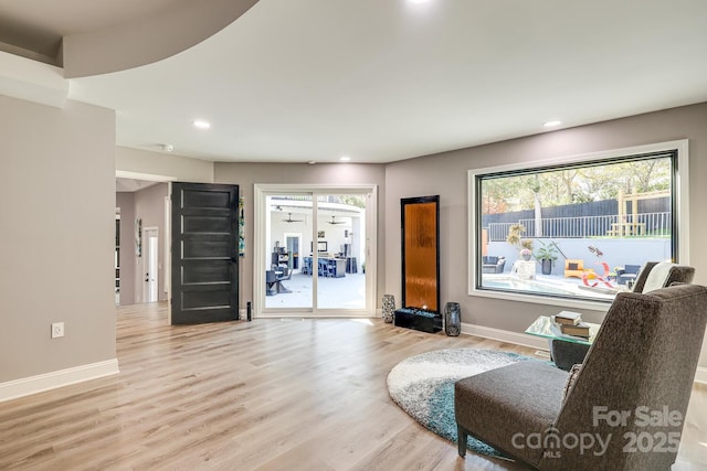 sitting room with light hardwood / wood-style floors