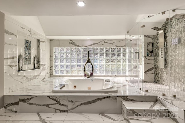 bathroom with lofted ceiling and separate shower and tub