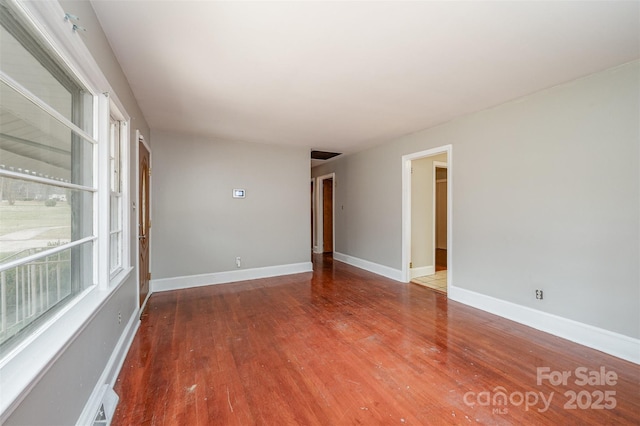 empty room featuring hardwood / wood-style floors