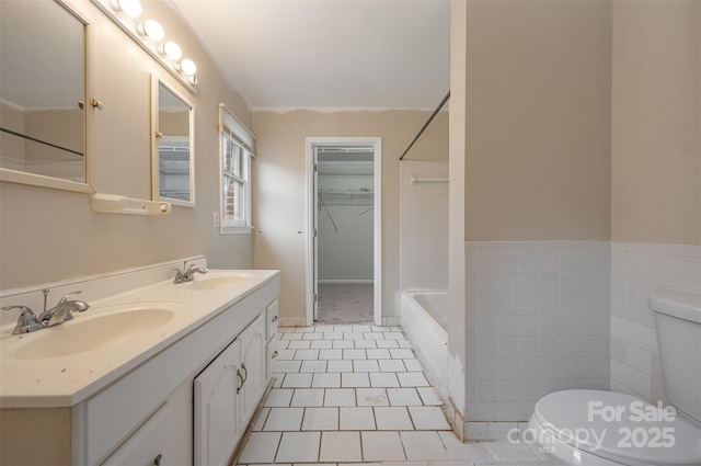 full bathroom with vanity, toilet, tile patterned flooring, and shower with separate bathtub