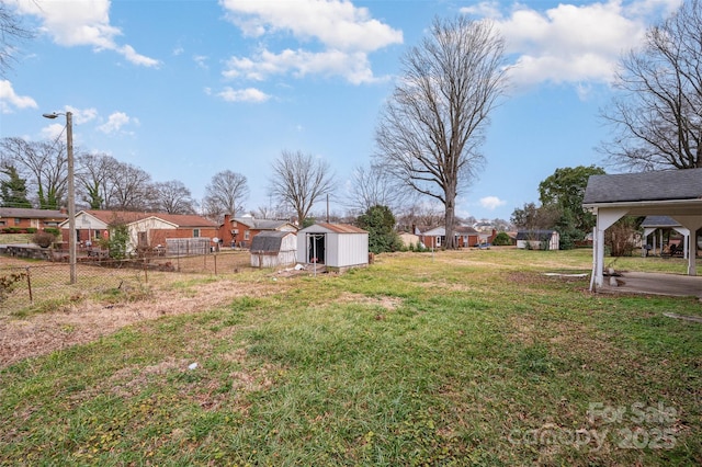 view of yard featuring a storage unit