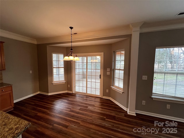 unfurnished dining area featuring a chandelier, dark wood-style flooring, visible vents, and baseboards