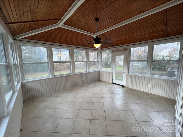 unfurnished sunroom with wood ceiling, vaulted ceiling, and a ceiling fan