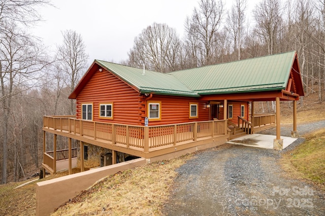 view of side of home featuring a deck