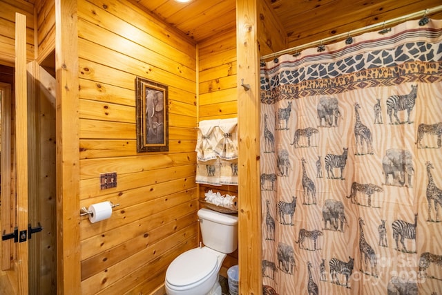 bathroom with a shower with shower curtain, wooden ceiling, and toilet