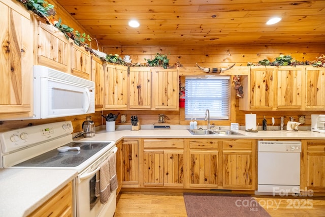 kitchen featuring wood ceiling, white appliances, light hardwood / wood-style floors, and sink