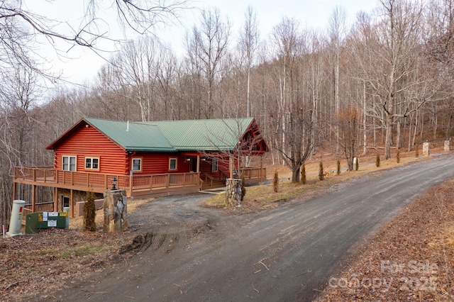 cabin with a deck