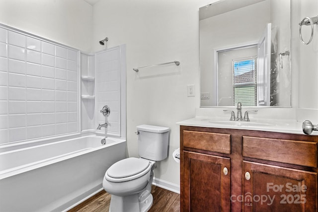 full bathroom featuring vanity, wood-type flooring, toilet, and shower / bath combination