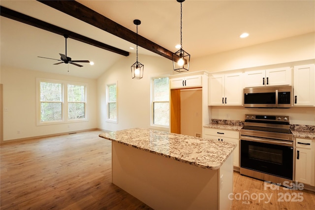 kitchen featuring a center island, light stone countertops, light wood-type flooring, vaulted ceiling with beams, and stainless steel appliances