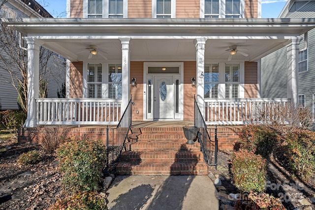 doorway to property featuring ceiling fan and covered porch