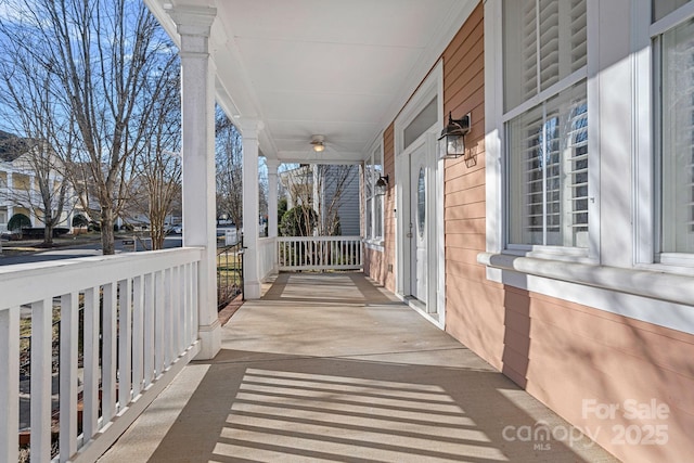 balcony featuring a porch