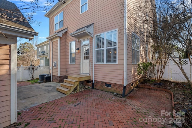 back of house with a patio