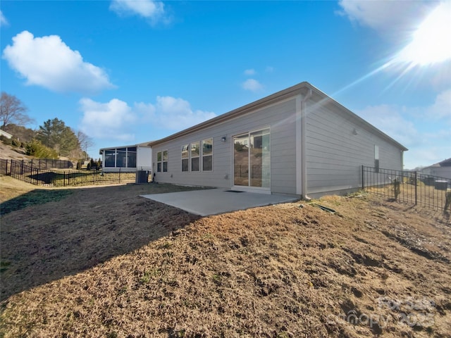 rear view of house featuring a patio area