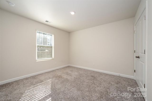 view of carpeted spare room