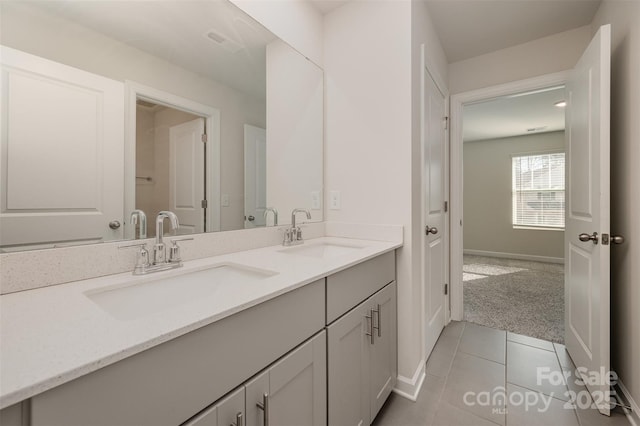 bathroom featuring vanity and tile patterned flooring