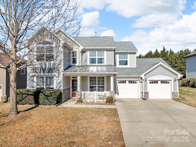 view of front of home with a front lawn and a porch