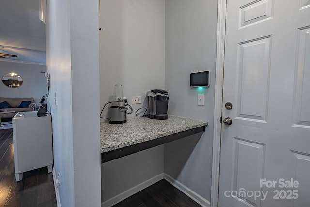 bathroom with hardwood / wood-style flooring