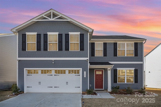 view of front of home featuring a garage