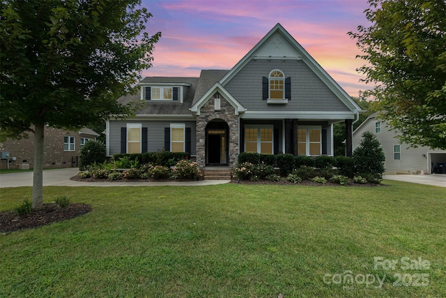 view of front of property with a lawn