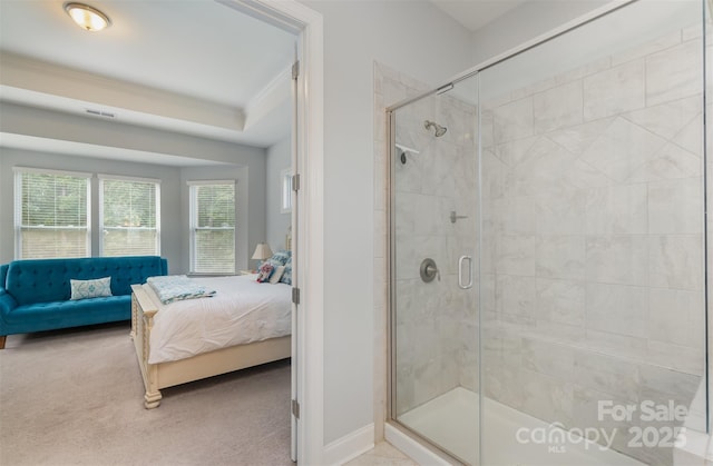 bathroom featuring crown molding and an enclosed shower