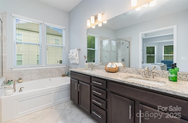 bathroom with plus walk in shower and vanity