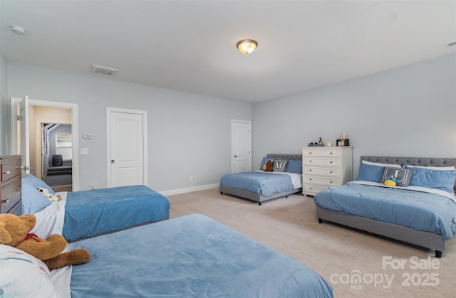 bedroom featuring light carpet