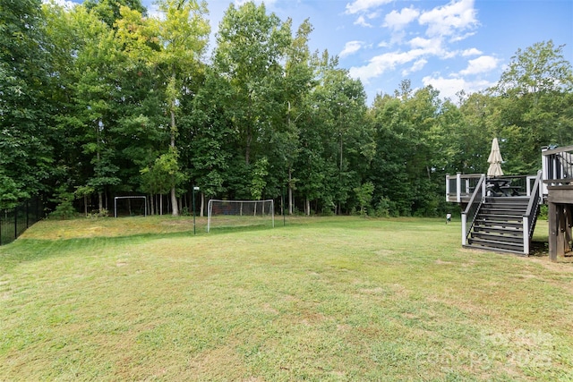 view of yard featuring a wooden deck