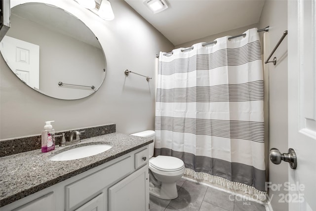 full bathroom featuring tile patterned flooring, vanity, shower / bathtub combination with curtain, and toilet