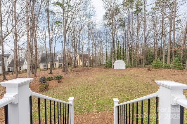 view of yard with a storage shed