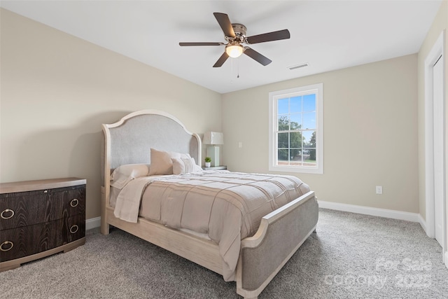 carpeted bedroom featuring ceiling fan