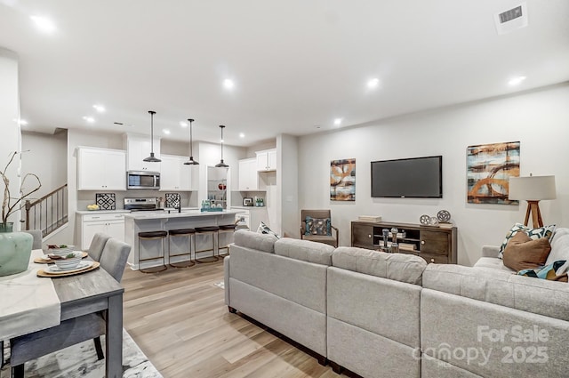 living room featuring light hardwood / wood-style floors