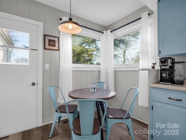 dining space with dark wood-style floors