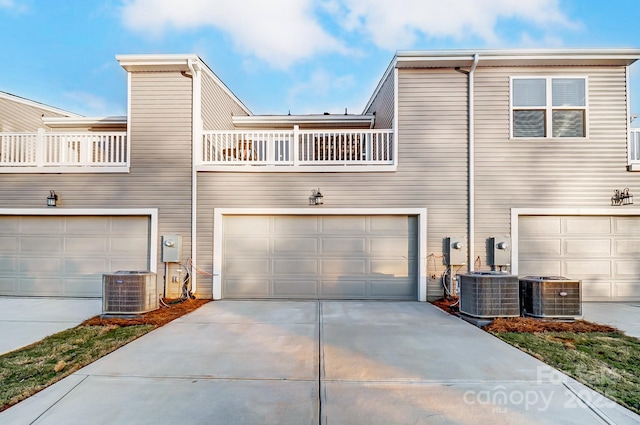 exterior space featuring a balcony and central AC