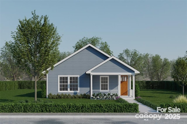 view of front facade featuring covered porch and a front lawn