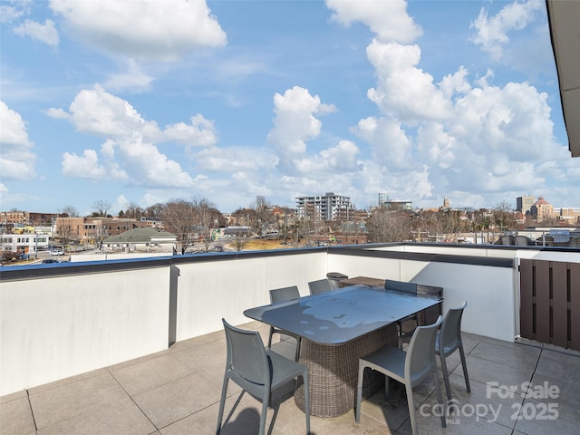 view of patio / terrace with a balcony