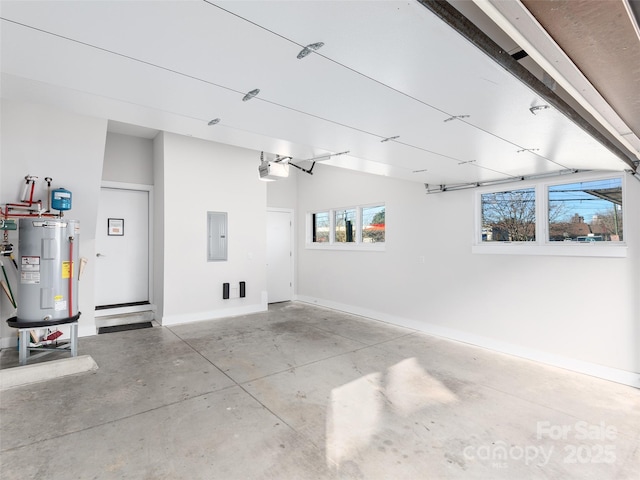 garage with a garage door opener, electric panel, and water heater