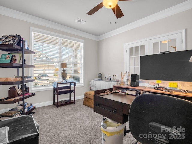 office with ornamental molding, light carpet, and ceiling fan