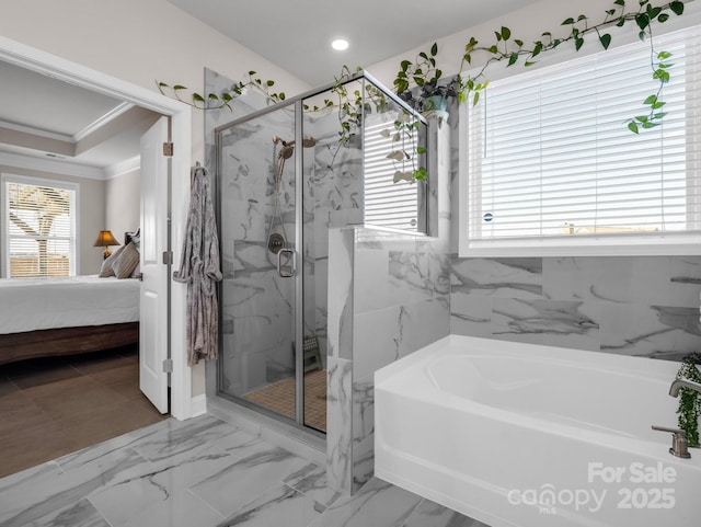 bathroom with independent shower and bath and crown molding