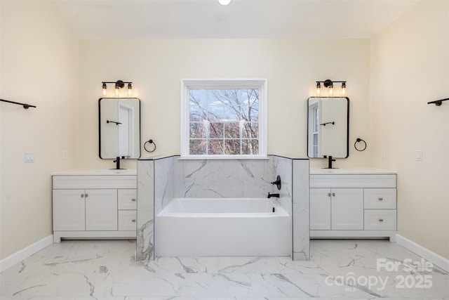 bathroom with vanity and a tub to relax in