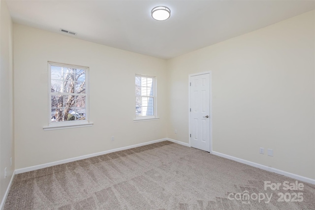 view of carpeted spare room