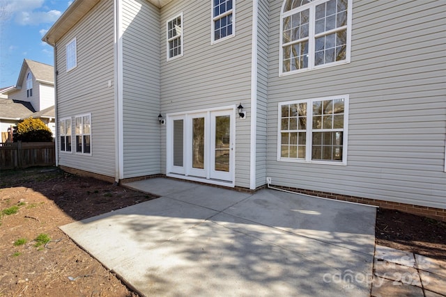 rear view of house featuring a patio