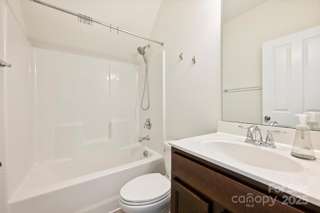 full bathroom featuring vanity, shower / bathing tub combination, and toilet