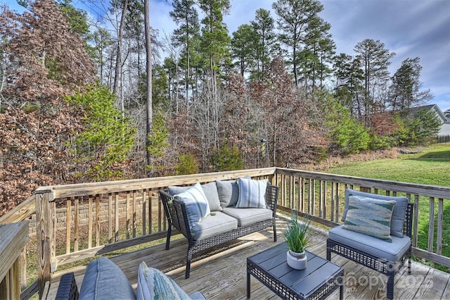 wooden deck with an outdoor living space