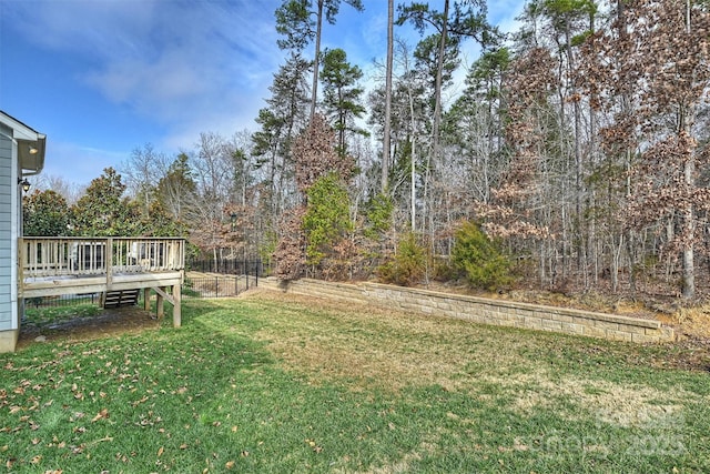 view of yard with a deck