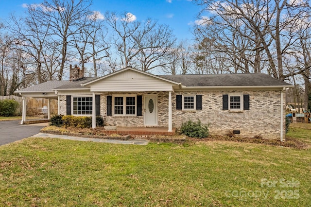 single story home featuring a carport and a front lawn