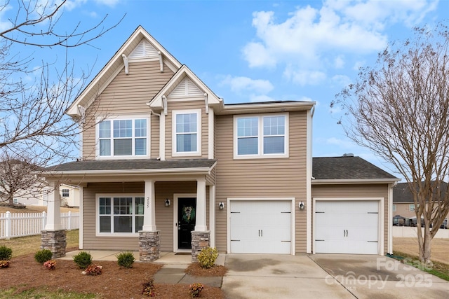 view of front of house with a garage and covered porch