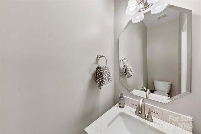 bathroom featuring sink and toilet