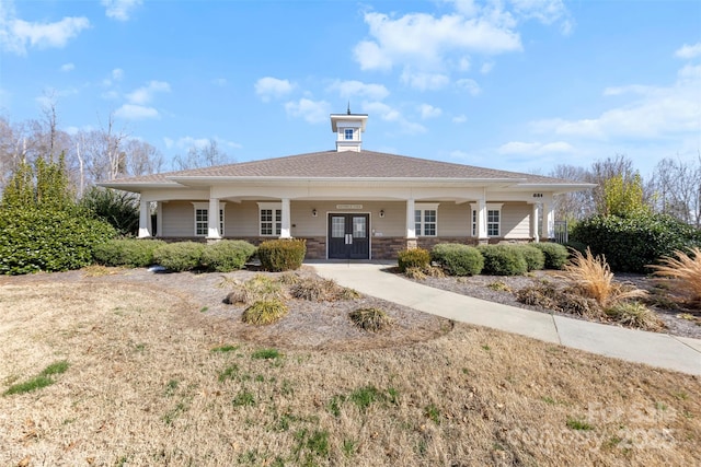 view of front of property featuring covered porch