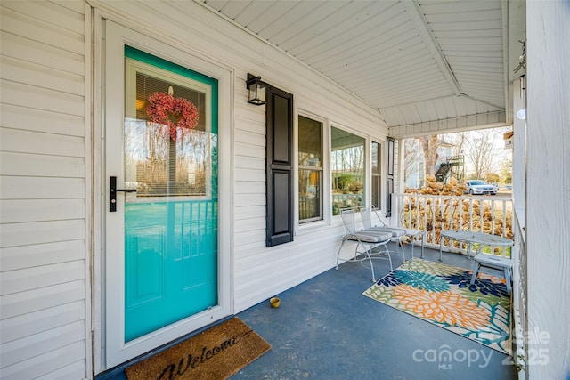 property entrance with a porch