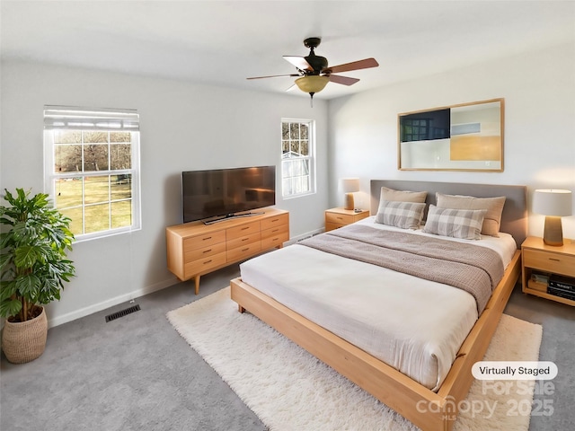 bedroom featuring ceiling fan and carpet flooring